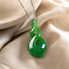 Carved Swirl Jade Pendant