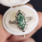 Emerald Marquise Halo Ring